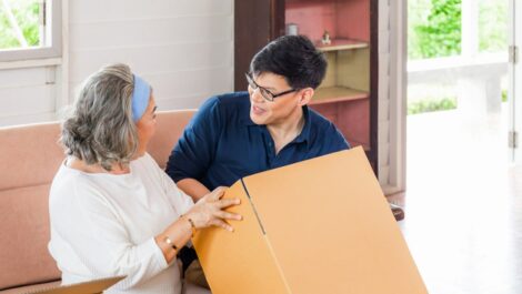 Son helping his mom declutter and downsize her home.