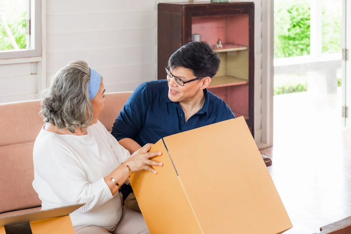 Son helping his mom declutter and downsize her home.